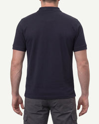 A model wears the STRAUSS Cotton Stretch Polo Shirt in nero blue, showing the shirt fit