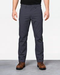 Chino Pants e.s.e:pic in nero blue worn by a model, front view