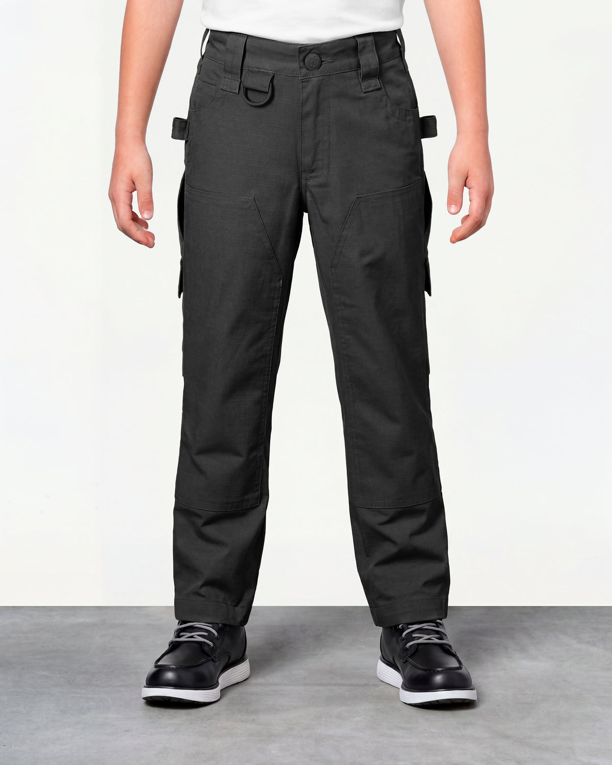 Kids' Double Front Ripstop Cargo Pants e.s.e:pic in black worn by a model, front view