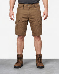 Model wearing Engelbert Strauss e.s. vintage cargo shorts in sepia, showing the fit, length, waistband, and front pocket layout of the rugged cargo work shorts with a vintage workwear look.