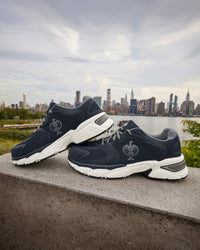 STRAUSS St. Louis Composite Toe Work Shoe in Nero blue worn in an outdoor work setting