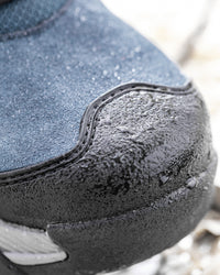 STRAUSS Turin 6-inch Aluminum Toe Work Boot in Oxid blue shown in use on the job
