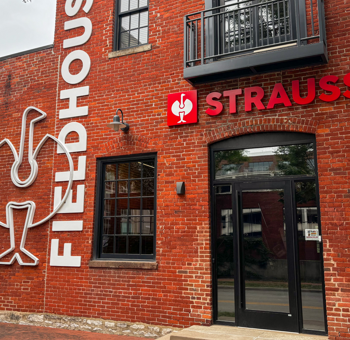 An image of the entrance of the STRAUSS store in Columbus