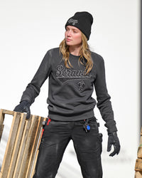 Women's STRAUSS e.s.e:pic artwork crew neck sweatshirt in carbon gray, worn in lifestyle setting