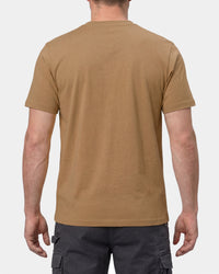 A model wears the STRAUSS Artwork T-Shirt e.s.e:pic in almond brown with work pants and work boots, showing the shirt fit