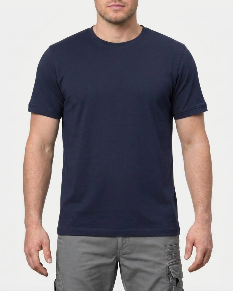 A model wears the STRAUSS Cotton Stretch T-Shirt in nero blue in a studio product scene