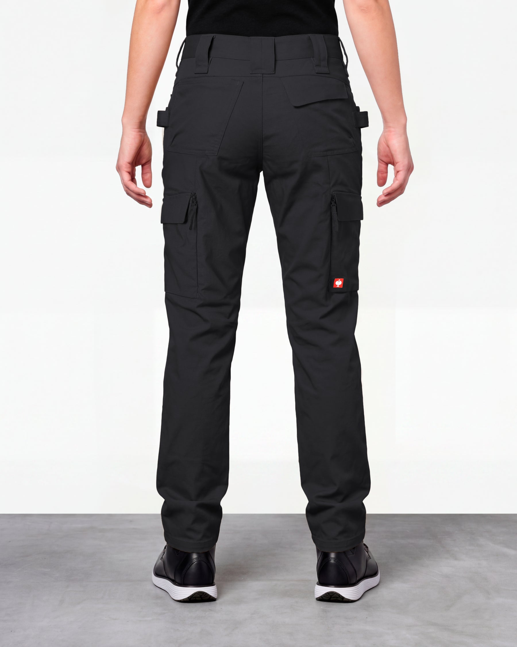 Women's Double Front Ripstop Cargo Work Pants e.s.e:pic in black worn by a model, rear view