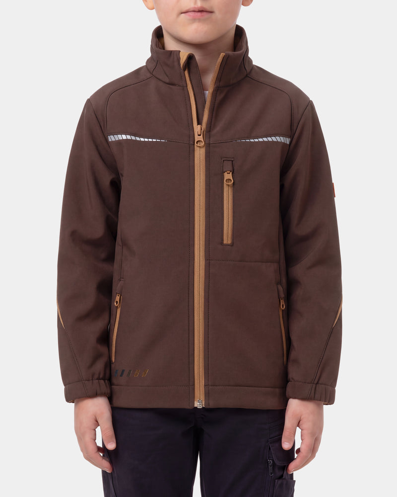 A child wearing a brown softshell jacket with tan zipper details and reflective chest stripes, shown against a light gray studio background.
