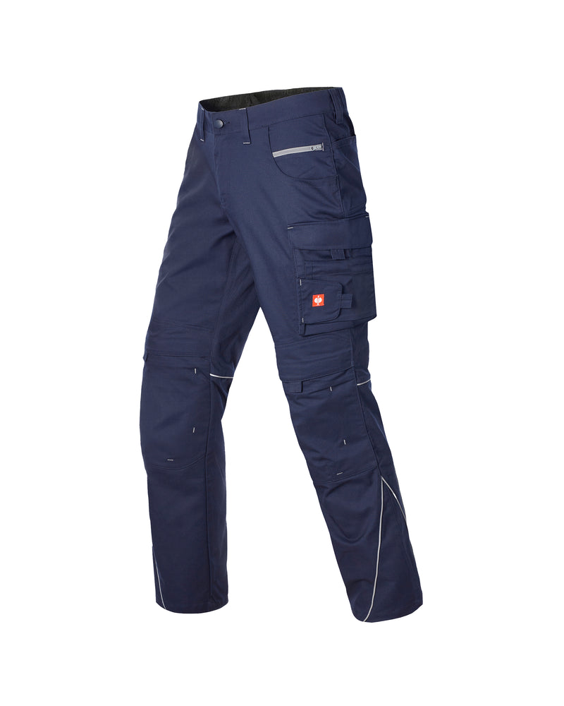 Navy blue cargo pants with grey accents in an active position on a white background.