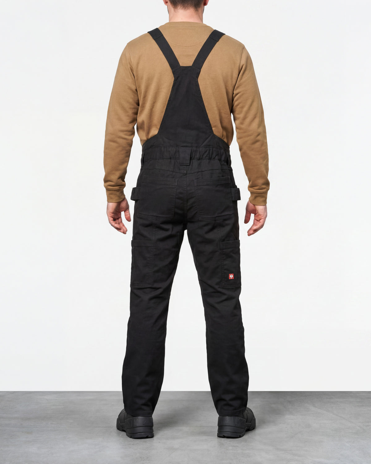 black STRAUSS Multipocket Work Bib Overall e.s.vintage worn by a model, back view