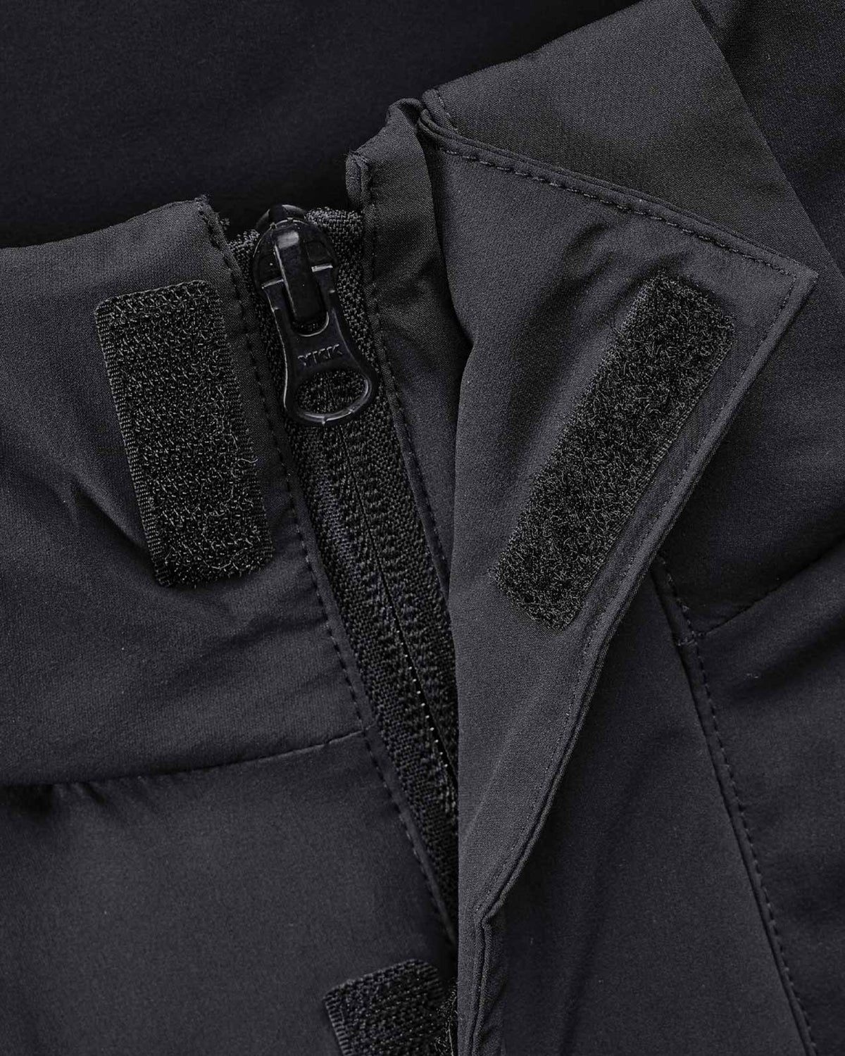 Close-up of insulated shell and hood details on STRAUSS e.s.trail winter jacket in black