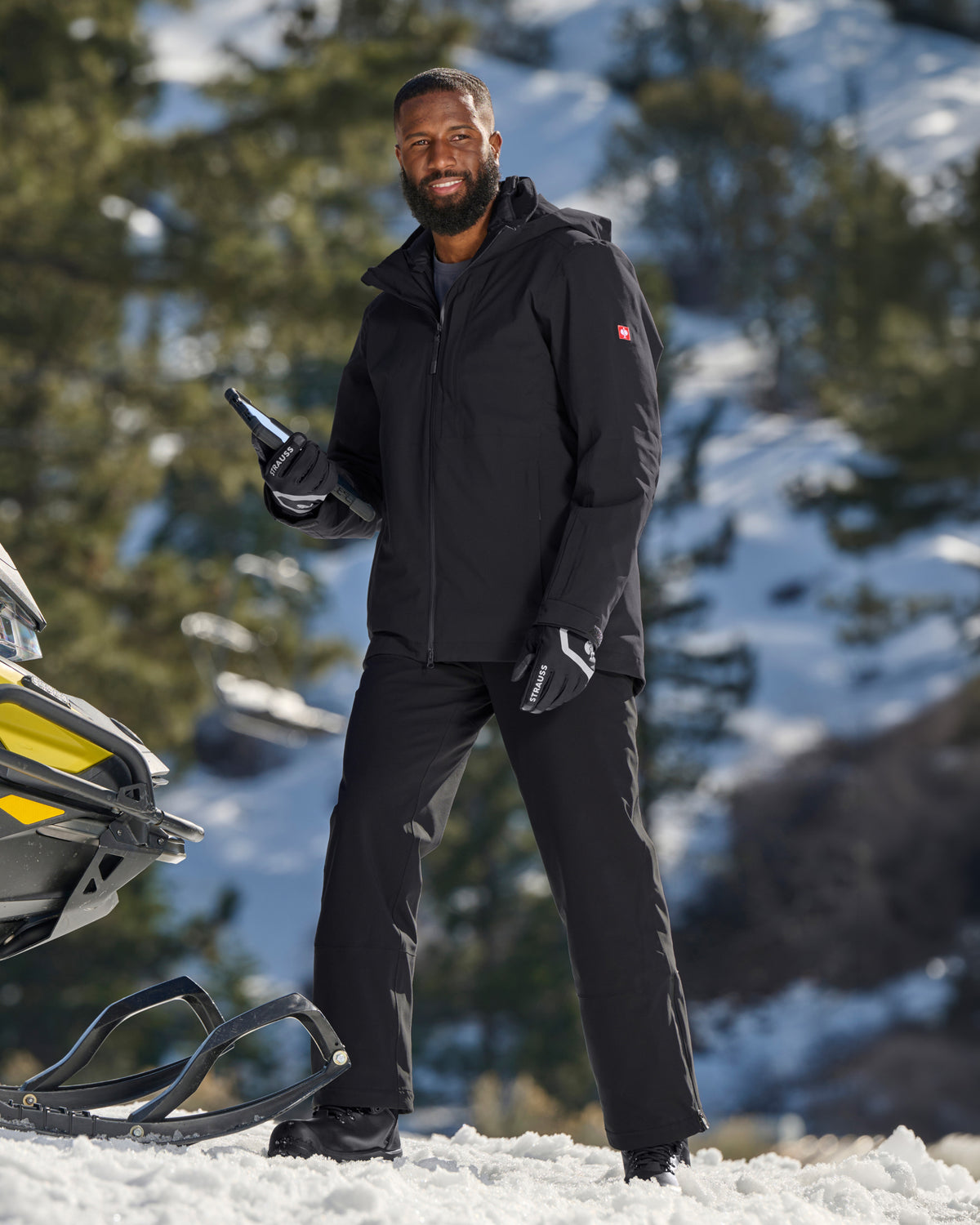 Lifestyle view of Functional Snow Pants e.s.trail pure in black during work