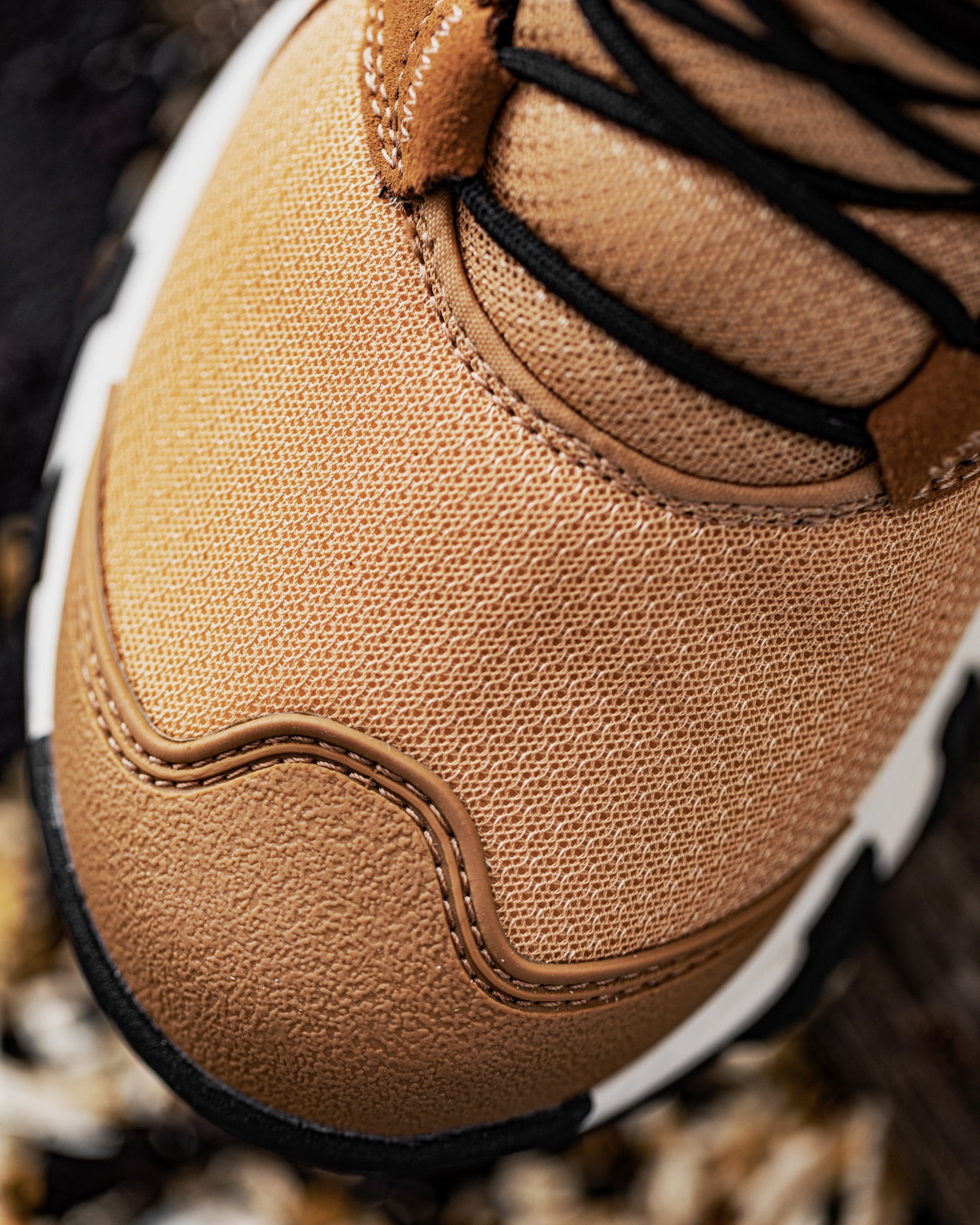 Close-up of the Almond brown and Cream Rimini 6-inch Soft Toe Boot soft toe area