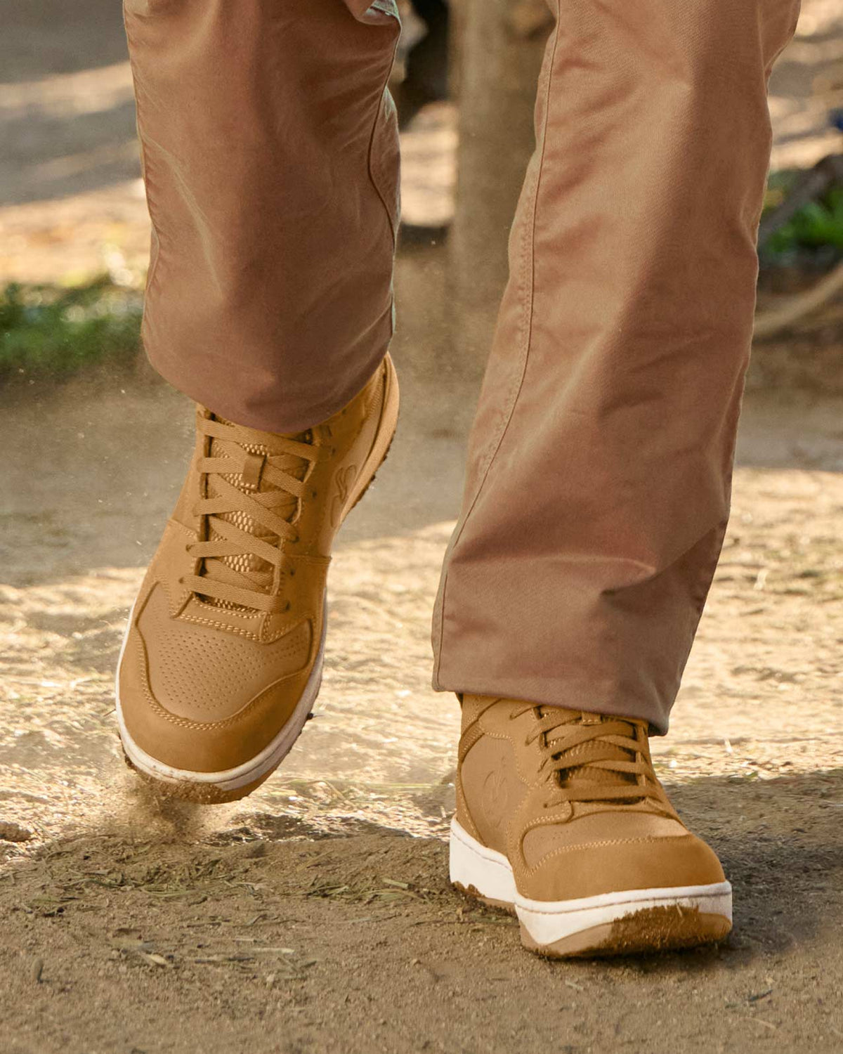 STRAUSS Eindhoven 6-inch Steel Toe Work Boot in Almond brown shown on rough jobsite ground