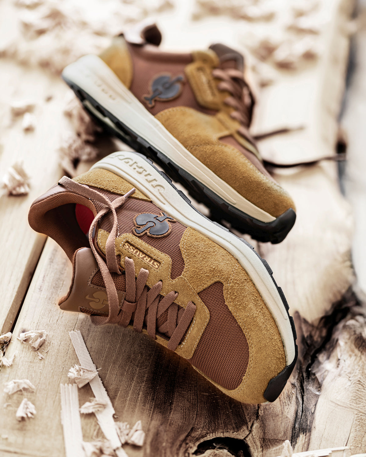 STRAUSS Canberra Steel Toe Work Shoe in Desert brown with workwear in a jobsite scene