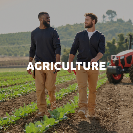 Two men walking in a field with 'AGRICULTURE' text overlay