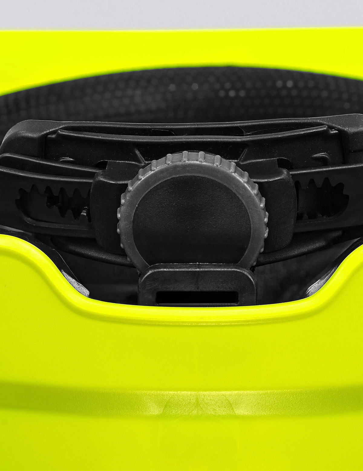 Close-up of the black adjustment dial and interior padding on the yellow STRAUSS Baseball Style Hard Hat, highlighting the fine gear-like details used to tighten or loosen the fit for optimal impact protection.