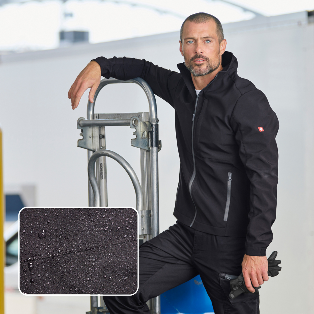 A man leaning against a metal bar with the dryplexx material highlighted