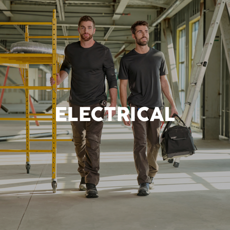 Two electricians walking in a warehouse with the word 'ELECTRICAL' displayed.