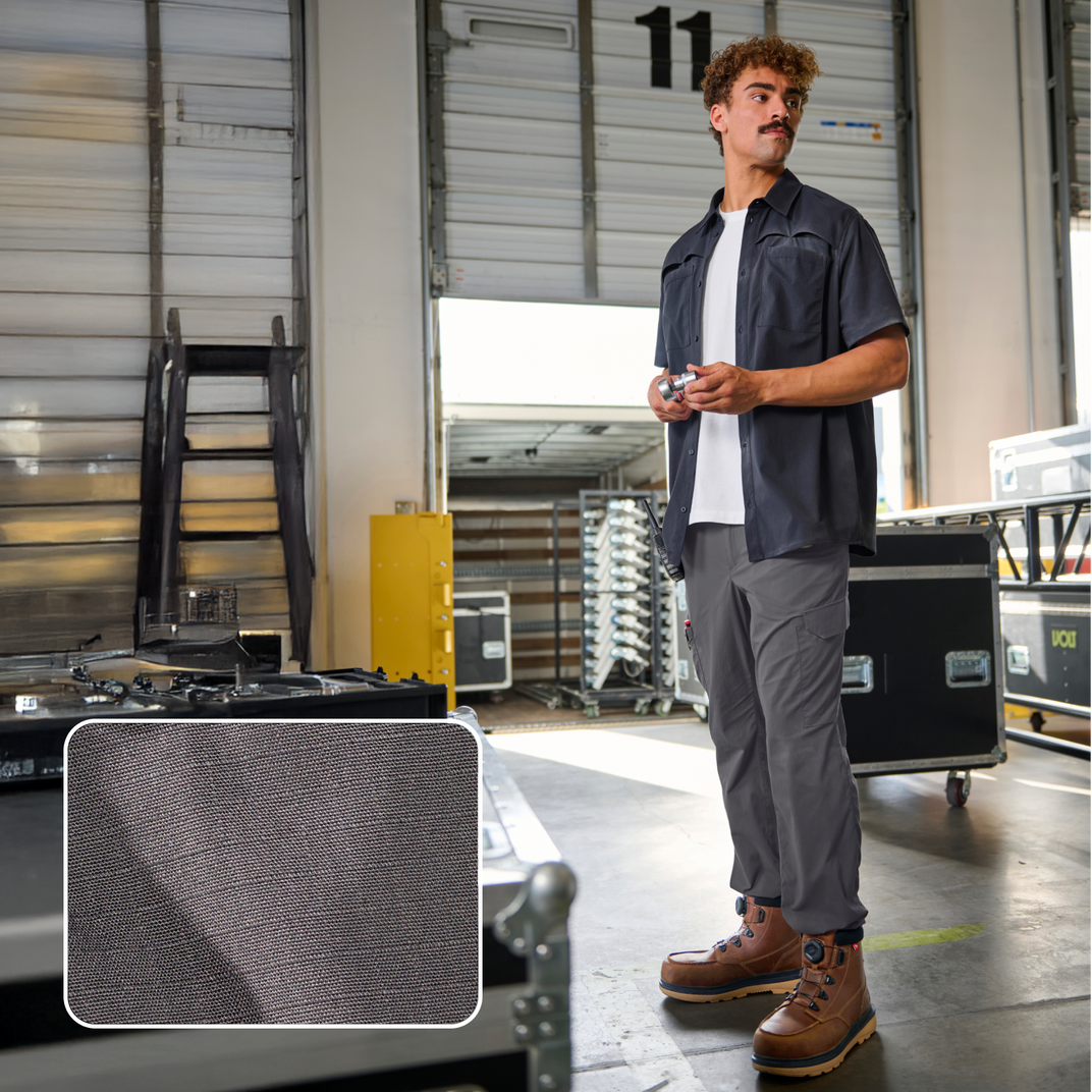 A man standing inside a warehouse, with the ripstop material highlighted