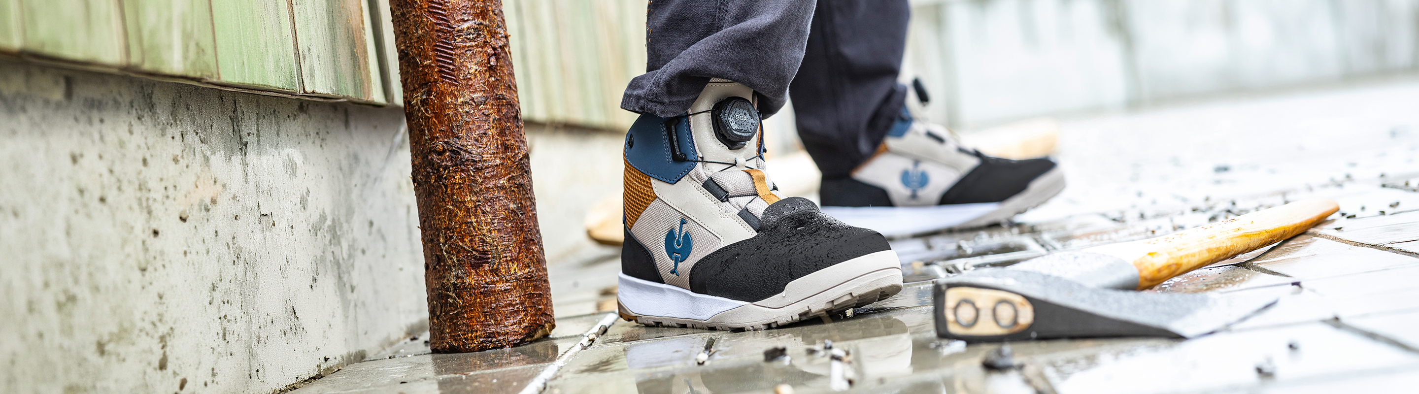 A pair of Murcia Work Boots worn in a wet environment.